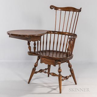 Writing-arm Windsor Chair, New England, late 18th century, with scroll-carved crest, rounded writing surface with undermounted drawer,
