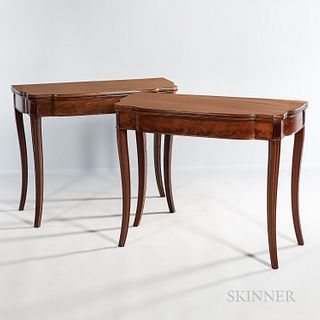 Pair of Federal Mahogany Card Tables, New York, c. 1810, the molded shaped tops on conformingly shaped frames with fluted corner panels