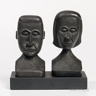 Small Carved Pair of Busts, late 19th/early 20th century, a male and a female, similarly carved with stylized features, overall ht. 4 1