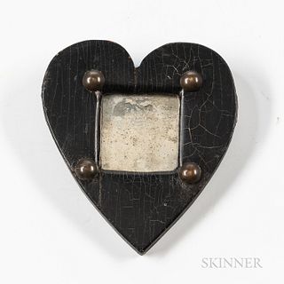 Ebonized Miniature Heart-form Mirror, 19th century, overall black-painted surface with craquelure, with brass tack decoration at the co