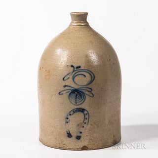 Cobalt-decorated Stoneware Jug, mid-19th century, decorated with a swirl above a dragonfly above a horseshoe, ht. 18 in.