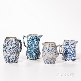 Four Spongeware Pitchers, 19th century, with blue decoration, two straight-sided, two barrel form, ht. to 9 in.