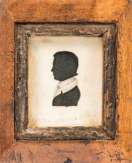 Framed Silhouette Portrait of a Man, America, 19th century, the hollow-cut silhouette with pencil collar details, held into its carved