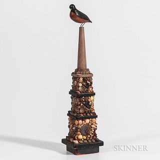 Carved and Painted Robin on a Shell-encrusted Tower, America, late 19th century, the robin perched on a stepped tower decorated with se