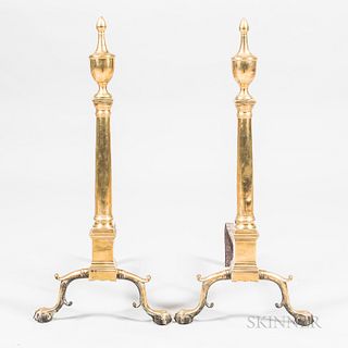 Pair of Brass Andirons, possibly New York, late 18th century, the urn tops on tapering shafts and molded square plinths with spurred ar