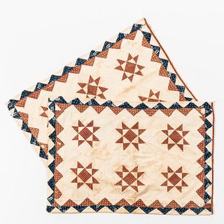 Pair of Pieced Patchwork Pillow Shams, Pennsylvania, c. 1870, with blue, brown, and red geometric patches, (staining, dye transfer, los