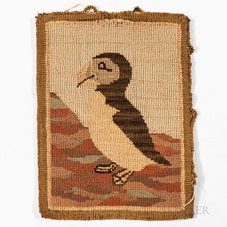 Hooked Mat Depicting a Puffin, Grenfell Labrador Industries, Newfoundland and Labrador, early 20th century, with label affixed to lower