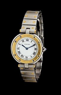* A Stainless Steel and Yellow Gold Santos Wristwatch, Cartier,