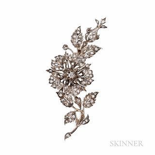 Antique Diamond Flower Brooch, France, c. 1880, the flowerhead set en tremblant, centering an old mine-cut diamond, and set with rose-c
