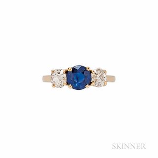 Sapphire and Diamond Ring, the circular-cut sapphire measuring approx. 6.57 x 6.82 x 3.78 mm, and weighing 1.31 cts., flanked by old Eu