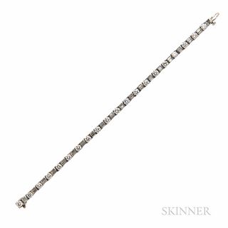 Platinum and Diamond Bracelet, set with full- and baguette-cut diamonds, approx. total wt. 6.50 cts., lg. 7 1/8 in.