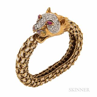 18kt Gold, Enamel, and Diamond Bracelet, Italy, with pave-set diamond head, and ruby navette eyes, joined to a flexible polychrome enam
