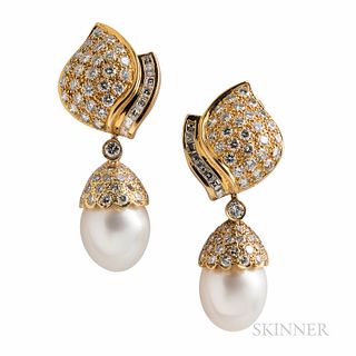 Cartier 18kt Gold, Cultured Freshwater Pearl, and Diamond Day/Night Earrings, the pearls with pave-set diamond caps, suspended from pav