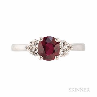 Platinum, Ruby, and Diamond Ring, set with a cushion-cut ruby weighing 1.53 cts., the shoulders set with full-cut diamonds, total wt. 0