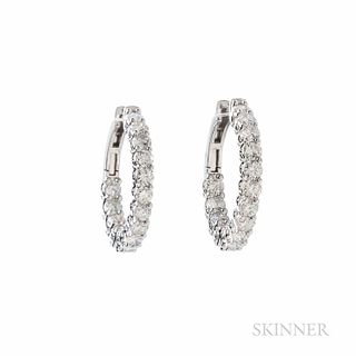 18kt White Gold and Diamond Hoop Earrings, set with thirty full-cut diamonds, total wt. 6.28 cts., 12.8 dwt, lg. 1 1/4 in.
