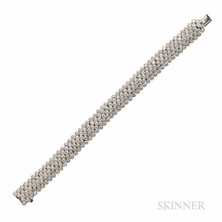 18kt White Gold and Diamond Bracelet, composed of 250 bezel-set diamond links, approx. total wt. 15.00 cts., 37.3 dwt, lg. 6 1/2, wd. 1