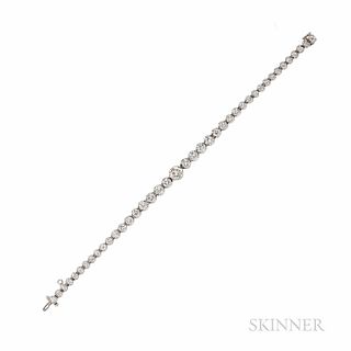 Platinum and Diamond Bracelet, set with full-cut diamonds graduating in size, approx. total wt. 5.58 cts., 15.6 dwt, lg. 6 3/8 in.