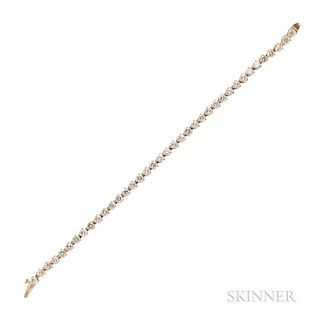 18kt Gold and Diamond Line Bracelet, set with thirty-eight full-cut diamonds, approx. total wt. 6.50 cts., 6.8 dwt, lg. 6 7/8 in.