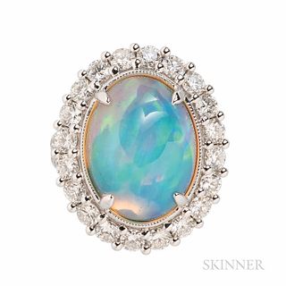 18kt White Gold, Opal, and Diamond Ring, bezel-set with an opal cabochon weighing 7.84 cts., framed by full-cut diamonds, total diamond