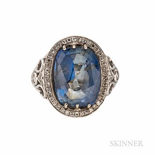 White Gold, Sapphire, and Diamond Ring, set with a cushion-cut sapphire weighing 8.92 cts., framed by full- and single-cut diamonds, si