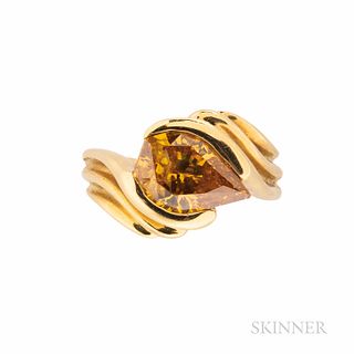 18kt Gold and Colored Diamond Ring, set with a modified pear brilliant-cut diamond weighing 2.07 cts., size 4 1/4. Note: Accompanied by