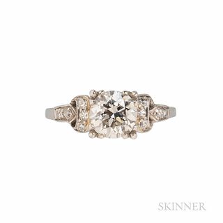 Platinum and Diamond Solitaire, set with a transitional-cut diamond weighing approx. 1.45 cts., the shoulders set with single-cut diamo