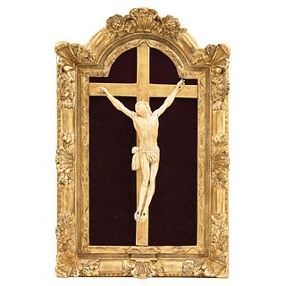 CRISTO CRUCIFICADO, 19th century, Ivory carving, gilded wooden cross, framed, 17.5 x 9.4" (44.5 x 24 cm)