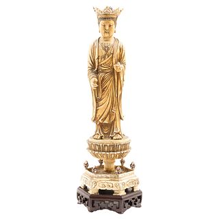 KUAN-YIN, CHINA, 20th century, Ivory carving, decorated in black ink, wooden base, 16.7" (42.5 cm)