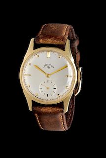 A 14 Karat Yellow Gold Wristwatch, Lord Elgin, Circa 1950's,