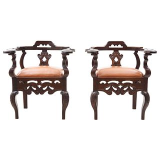 PAIR OF ARMCHAIRS, 20th century, Made of wood, openwork decoration and reliefs, 34.6 x 31.1 x 27.5" (88 x 79 x 70 cm)