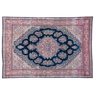 IRANIAN RUG, 20th century, KIRMAN STYLE, Made of wool, hand-knotted, decorated with floral motifs, 118.1 x 174" (300 x 442 cm)