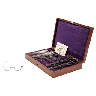 OPTOMETRIST CASE, FRANCE, CA. 1900, Case made of wood, lined in purple velvet and satin, 2.1 x 12.5 x 8.4" (5.5 x 32 x 21.5 cm)