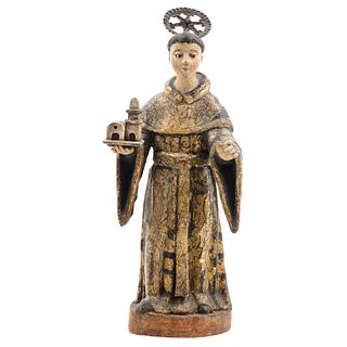SANTO TOMÁS DE AQUINO, MÉXICO, 18th century, Carved in polychrome wood with glass eyes and silver metal halo, 18.1" (46 cm) in height