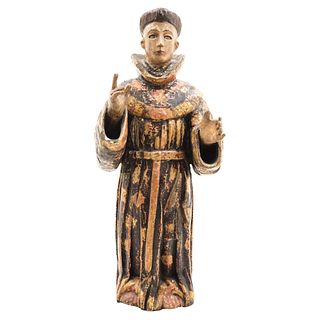 SANTO AGUSTINO, MÉXICO, 18th century, Carved in polychrome wood with glass eyes, conservation details, 24" (61 cm) in height