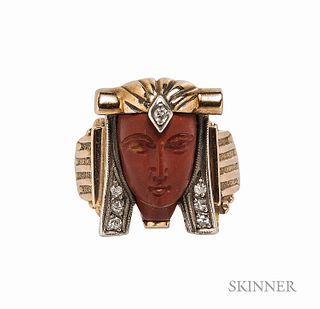 Egyptian Revival Gold and Diamond Ring, the hardstone figure wearing a headdress with single- and full-cut diamond melee, 3.9 dwt, size