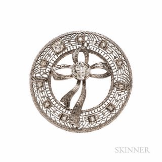 Art Deco 14kt White Gold and Diamond Bow Brooch, designed as a bow set with an old mine-cut diamond weighing approx. 1.00 cts., in a fi