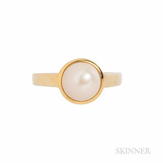 G. Petochi 18kt Gold and Natural Pearl Ring, the button pearl measuring approx. 8.25 x 7.28 mm, and weighing 3.38 cts. (13.52 grains),