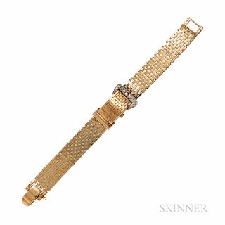 Retro 14kt Gold and Diamond Covered Wristwatch, the buckle motif set with single-cut diamonds, 29.1 dwt, lg. 6 7/8 in.