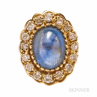 14kt Gold, Sapphire, and Diamond Ring, set with an oval cabochon sapphire measuring approx. 13.50 x 10.50 x 7.00 mm, framed by full-cut