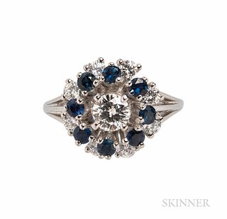 J.E. Caldwell & Co. Platinum, Diamond, and Sapphire Ring, centering a full-cut diamond weighing approx. 0.50 cts., framed by full-cut d