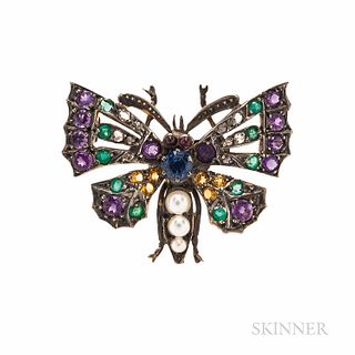 Gem-set Butterfly Brooch, including sapphire, amethysts, and emeralds, rose-cut diamond and split pearls, silver-topped gold mount, 1 3