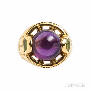 Faraone 18kt Gold and Amethyst Ring, set with a circular cabochon measuring approx. 12.00 mm, buff-top peridot shoulders, 9.0 dwt, size