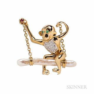 Whimsical 18kt Gold and Diamond Monkey on a Swing Pendant/Brooch, with pave-set diamonds, and emerald eyes, on a Biwa pearl swing, 9.2
