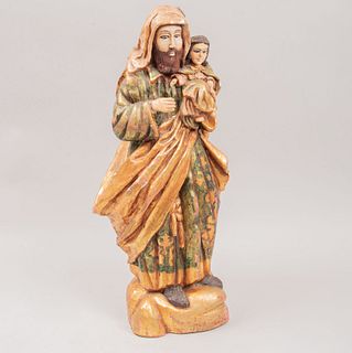 San José cargando al Niño Jesús. México. Siglo XX. En talla de madera estucada, policromada y dorada. Con ojos de vidrio.