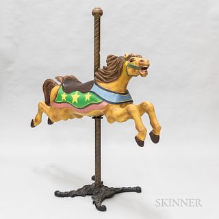 C.W. Parker Company "Jumper" Polychrome Carved Carousel Horse, Leavenworth, Kansas, c. 1917, mounted on a cast iron base, ht. 64, wd. 6