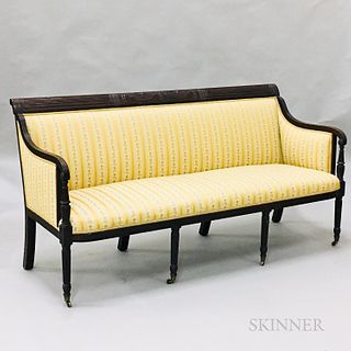 Federal Carved and Upholstered Mahogany Sofa, the scrolled cresting with a central panel with drapery flanked by two reeded panels cont
