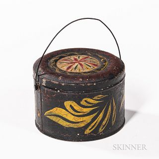 Small Polychrome-decorated Tinware Cannister, with covered lid and wire handle, (imperfections), ht. 3, wd. 4 1/4 in.