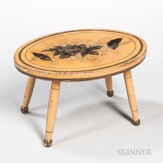 Yellow-painted Oval Maple Stool, New England, 19th century, the top with a spray of grapes and leaves within a green line border, on fo