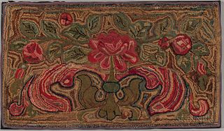 Floral Hooked Rug, America, 19th century, the central floral and leaf design within a linear border, ht. 28 1/2, wd. 50 1/2 in.