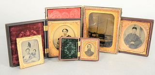 Group of five tintypes and ambrotype, two of union soldiers, one of child with doll and parrot on perch, one ambrotype of ship in front of buildings, 
